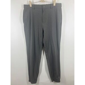 Uniqlo Mens Ultra Stretch Active Jogger Pants Gray Tapered Zip Pocket M